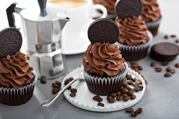 Chocolate coffee cupcakes with dark frosting — Stock Photo, Image