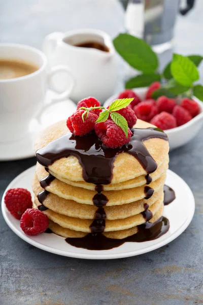 Stack of fluffy buttermilk pancakes with chocolate — Stock Photo, Image