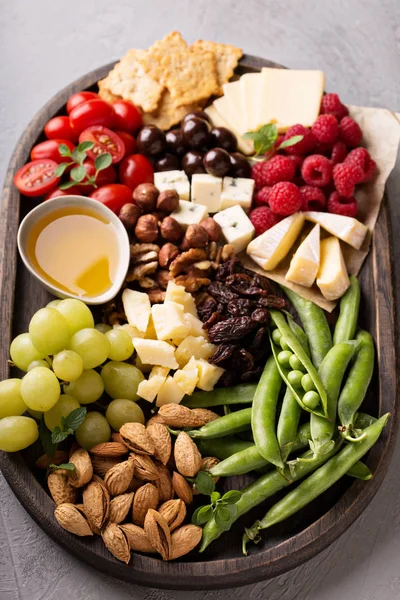 Cheese plate with fresh vegetables and fruits — Stock Photo, Image