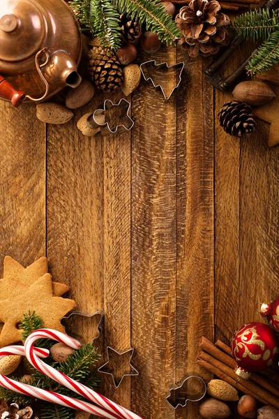 Christmas background with nuts, decorations and candy cane — Stock Photo, Image