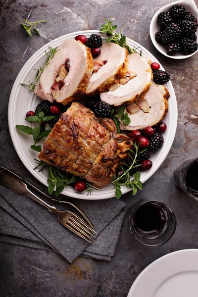 Roasted pork loin stuffed with apple and cranberry