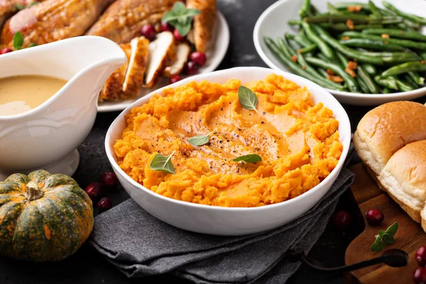 Mashed sweet potatoes on Thanksgiving table — Stock Photo, Image