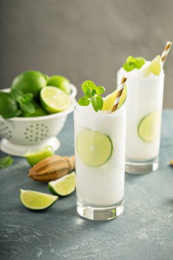 Refreshing lime frozen cooler or slushie clipart