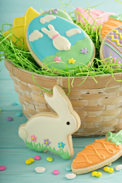 Easter cookies on blue table — Stock Photo, Image