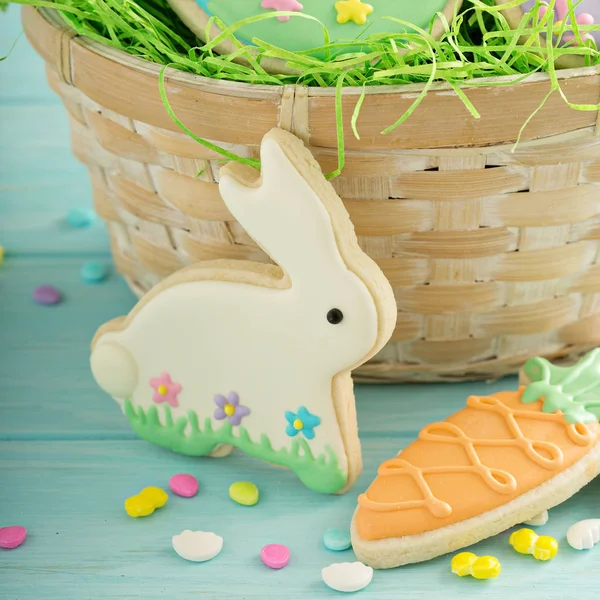 Easter cookies on blue table — Stock Photo, Image