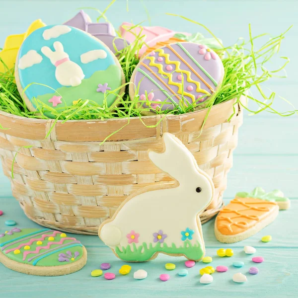 Easter cookies on blue table — Stock Photo, Image