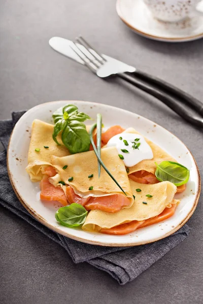 Savory crepes with salmon filling — Stock Photo, Image