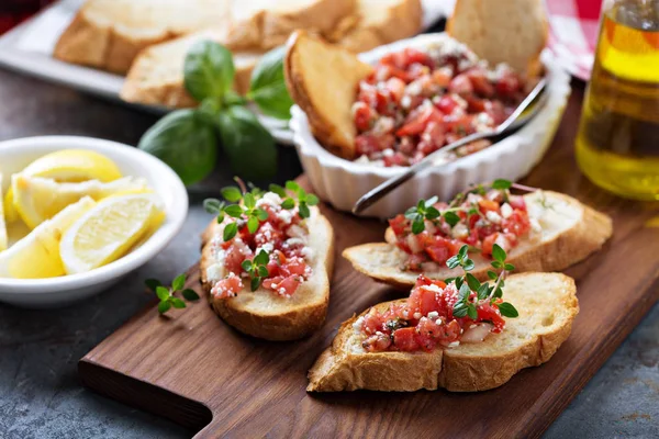 Roasted tomatoes bruschetta with thyme — Stock Photo, Image