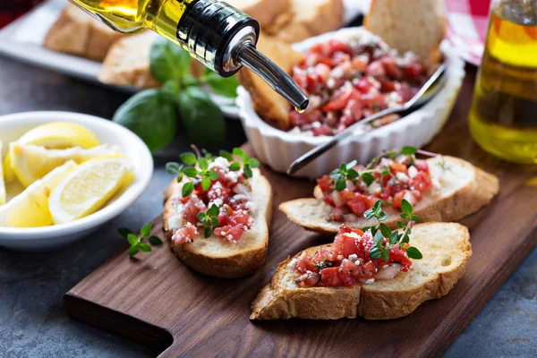 Roasted tomatoes bruschetta with thyme — Stock Photo, Image