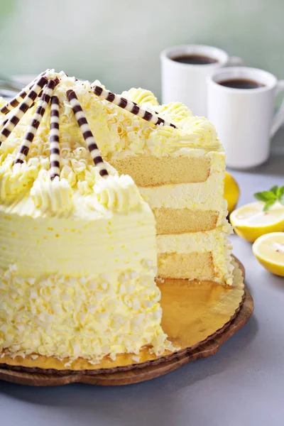 Lemon layered cake decorated with chocolate — Stock Photo, Image