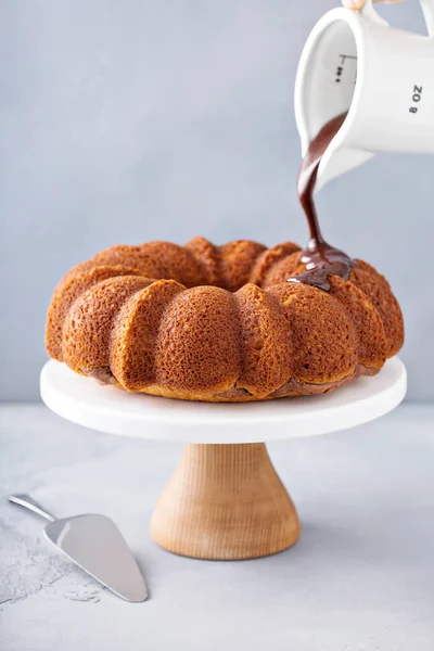 Vanilla bundt cake with chocolate glaze — Stock Photo, Image