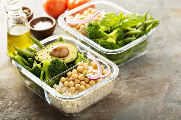 Vegan meal prep containers with cooked rice and chickpeas — Stock Photo, Image