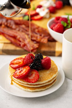 Stack of pancakes with berries