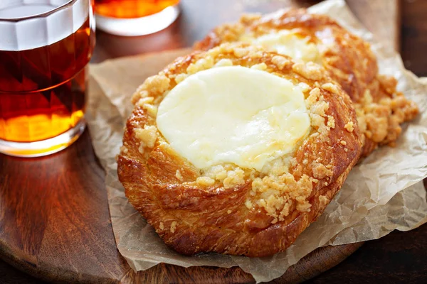 Cream cheese danishes with cinnamon tea — Stock Photo, Image