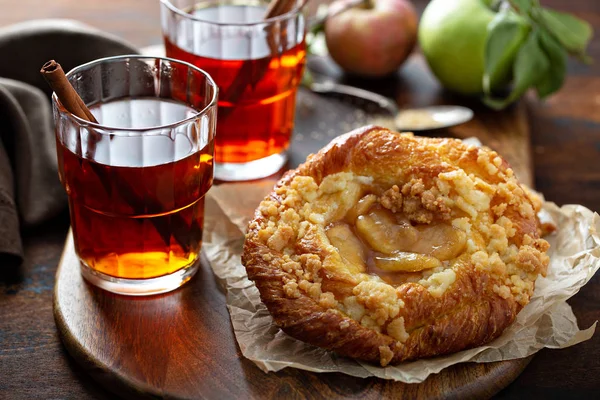 Apple danish pastry with cinnamon tea — Stock Photo, Image