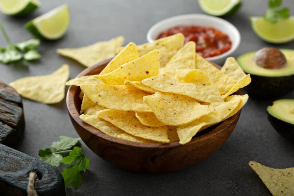 Tortilla chips in a bowl with salsa