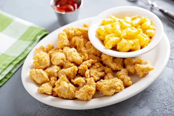 Fried popcorn chicken with mac and cheese