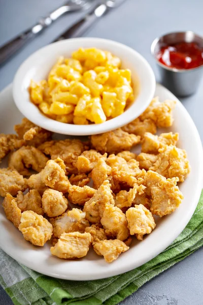 Fried popcorn chicken with mac and cheese