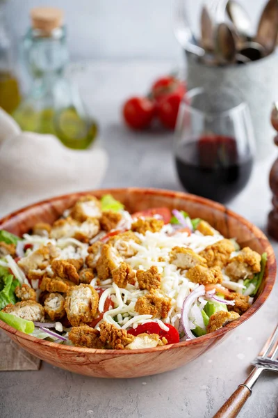 Chicken nuggets salad with lettuce — Stock Photo, Image