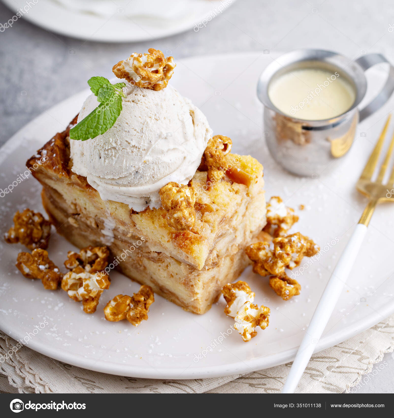 Caramel apple bread pudding with ice cream Stock Photo by ©fahrwasser