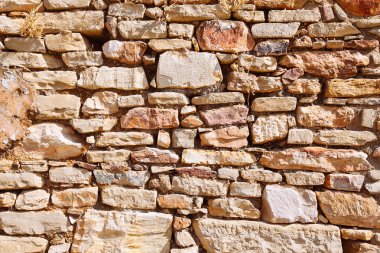 Taş duvar dokusunun arkaplanı 