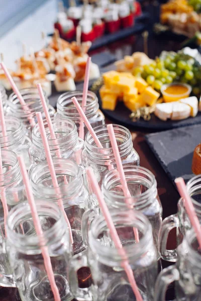 Empty jars on a banquet table — Stock Photo, Image