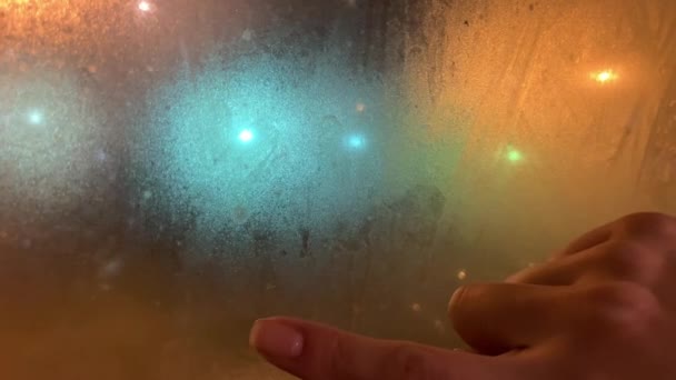 Close Female Finger Drawing Heart Shape Wet Window Street Light — Stock Video
