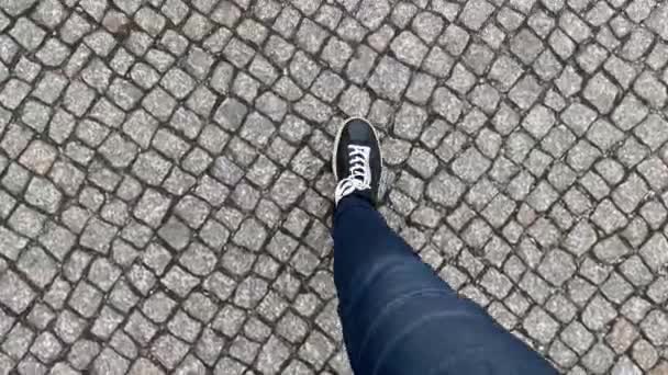 Feet Black Sneakers Walking City Stepping Sett Road — Stock Video