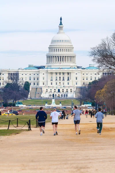 WASHINGTON DC, USA - JANUARY 31, 2006: Four running men in The N — Stock Photo, Image