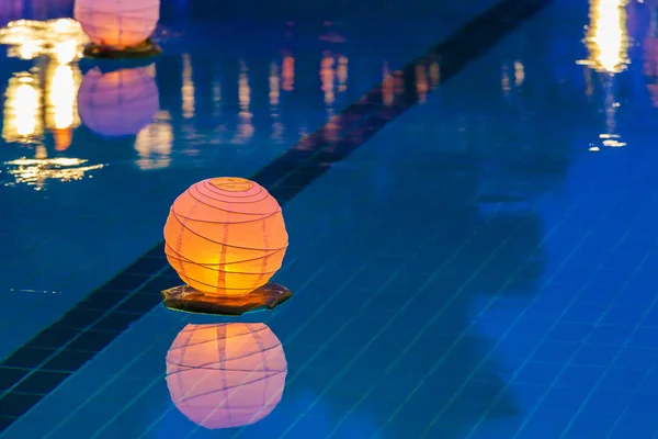 Floating water lantern in the pool — Stock Photo, Image