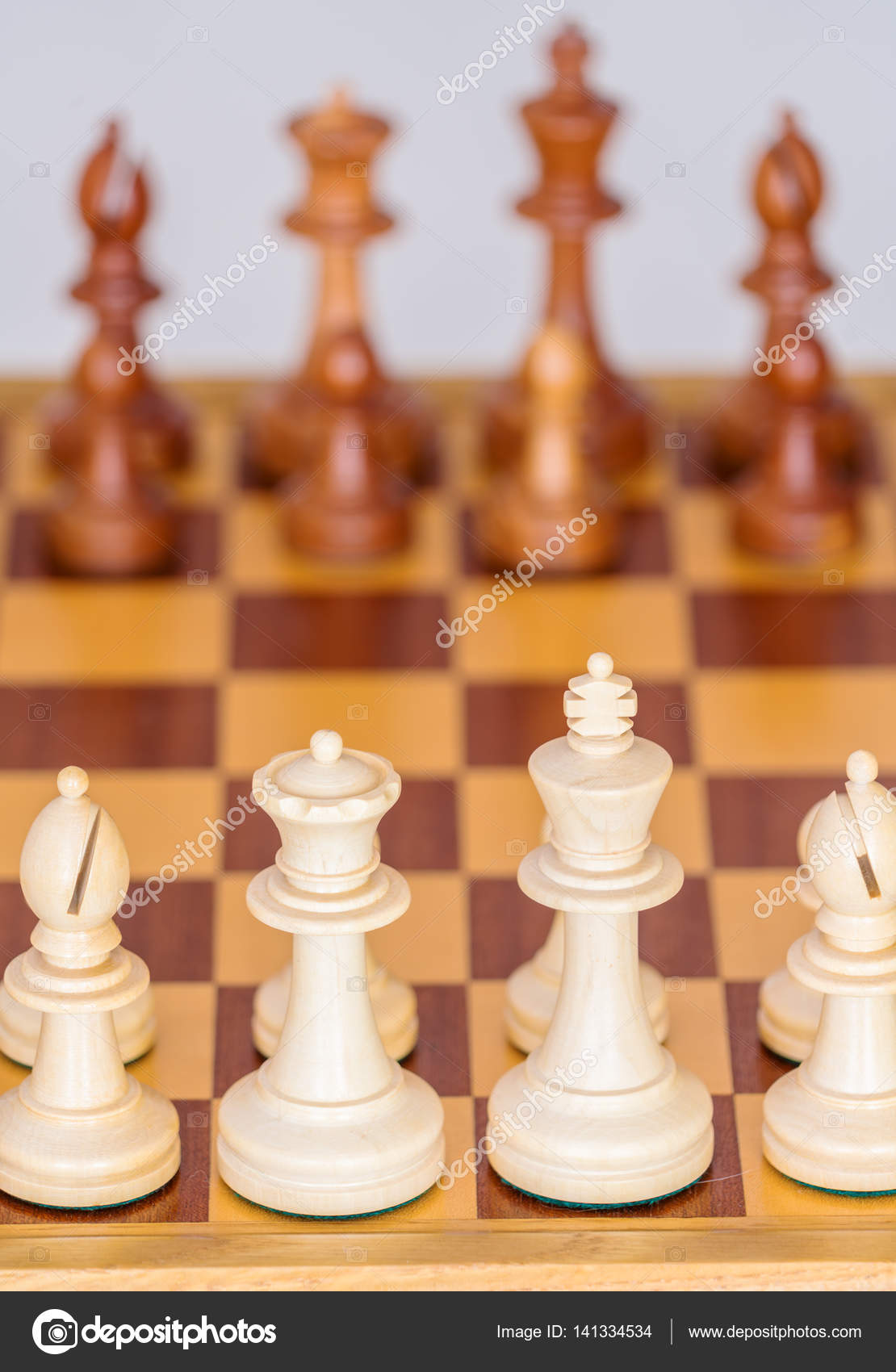 Wooden chess board with starting position