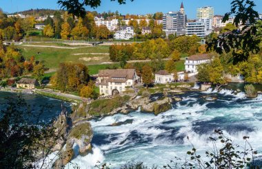 The Rhine Falls near Zurich at Indian summer, waterfall in Switz clipart