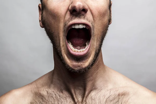 Ο άνθρωπος πρόσωπο φωνάζοντας — Φωτογραφία Αρχείου