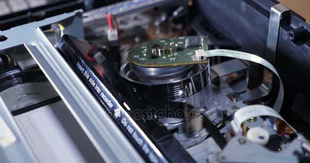 Inside View of VHS Tape Inserted into VCR Top Off — Stock Video