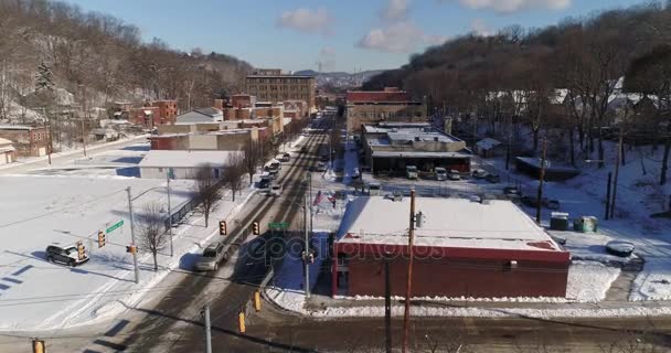 Forward Aerial Establishing Shot Small Town Business District in Winter — Stock Video