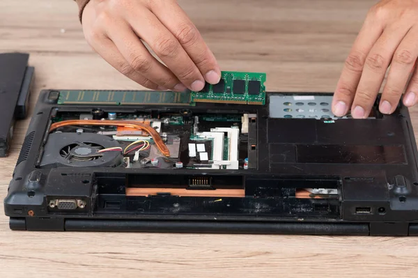 The laptop computer was dismantled to repair internal equipment.