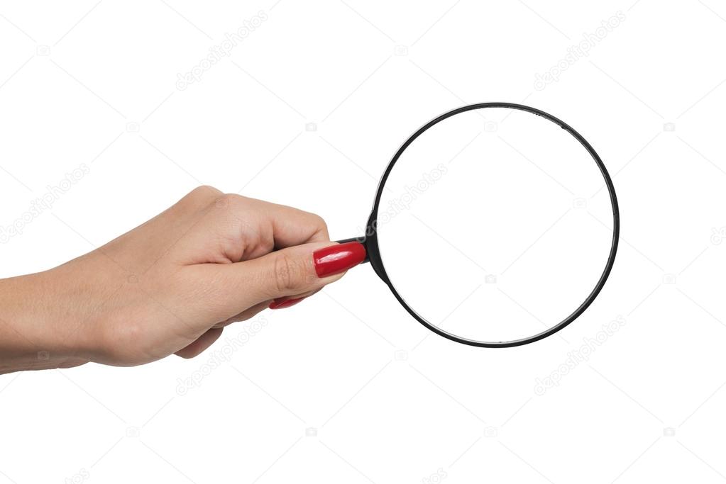 hand holding a magnifying glass isolated on white background