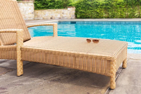 The sun lounger by the pool — Stock Photo, Image