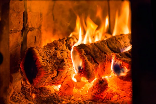 Fire and coals in fireplace furnace Royalty Free Stock Images