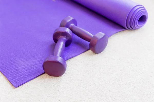 Fitness yoga pilates equipment props on carpet