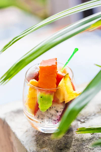 Glass of tropical exotic fruits salad — Stock Photo, Image