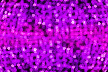 Bokeh mor, violet odaklanmamış Noel ışıkları arka plan bulanıklık
