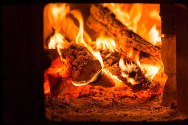 Fire and coals in fireplace furnace Stock Image