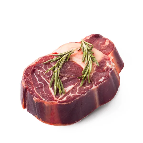 Raw beef steak with rosemary isolated on white — Stock Photo, Image