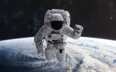 Dünya 'nın yörüngesinde bir astronot. Güneş Sistemi