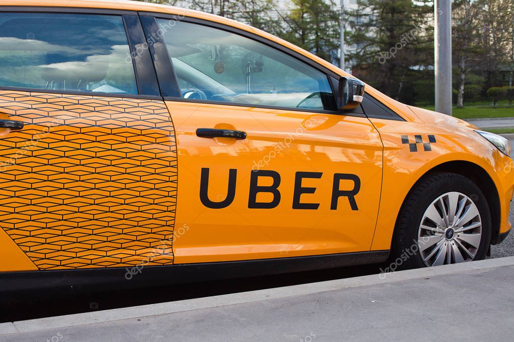 Uber taxi on the street. Moscow. MAy, 13, 2017