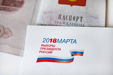 Invitation card to vote at presidential election day and passport. Russia. Moscow. March,18,2018 clipart