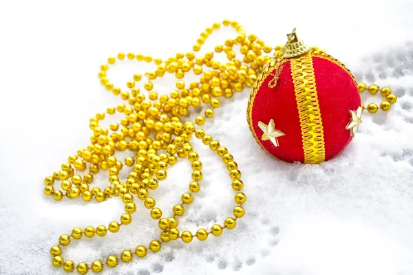 Christmas decoration. Festive Christmas card. Toy ball in the sn — Stock Photo, Image
