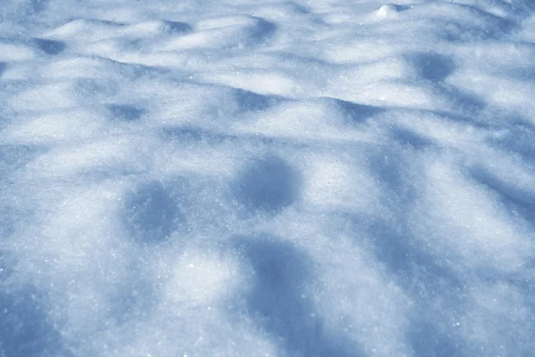 Achtergrond. Winterlandschap. De textuur van de sneeuw — Stockfoto