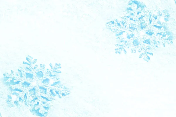 White fluffy snowflakes on snow. Winter christmas background. — Stock Photo, Image